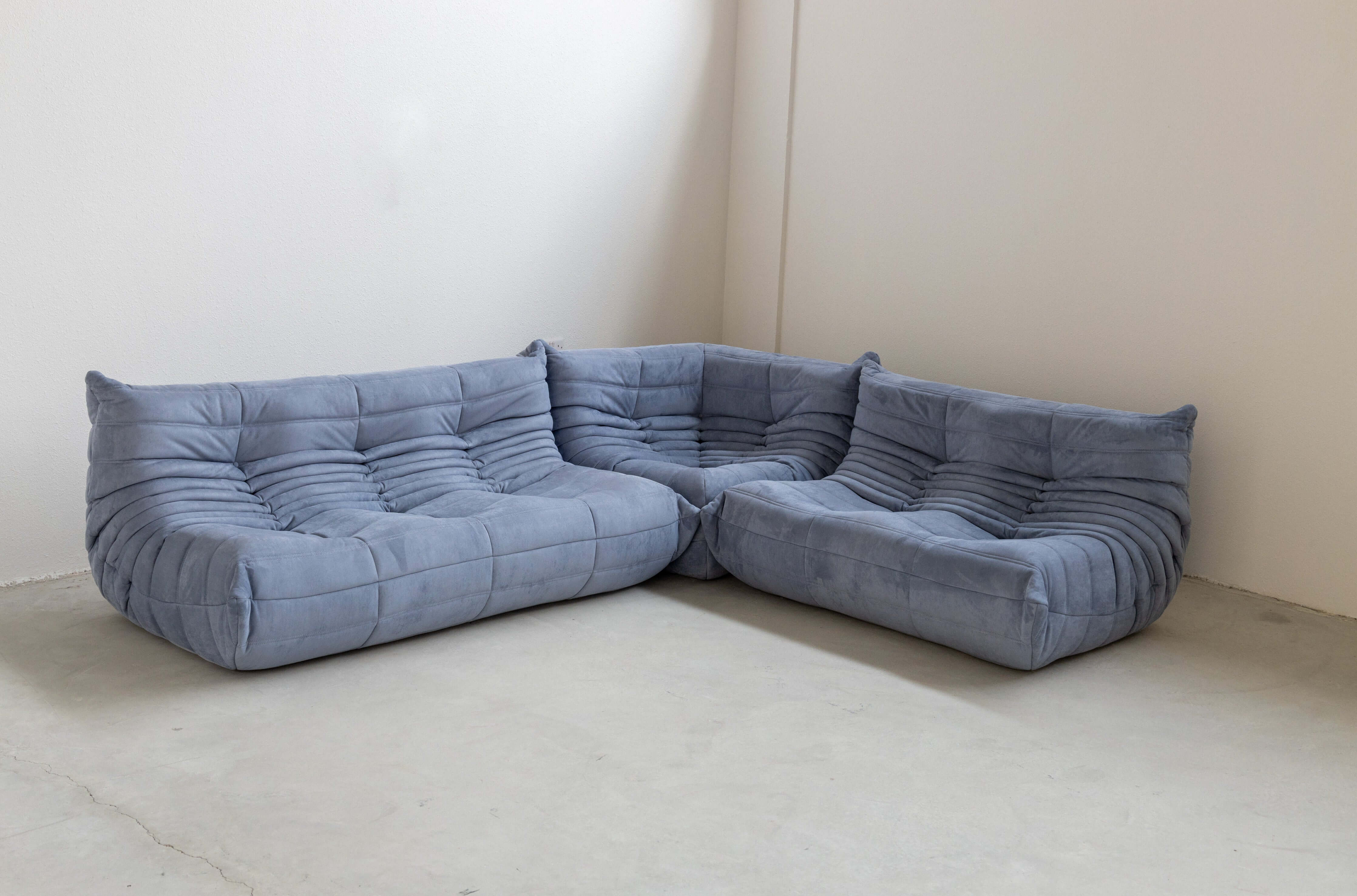Light blue corner modular sofa with suede fabric