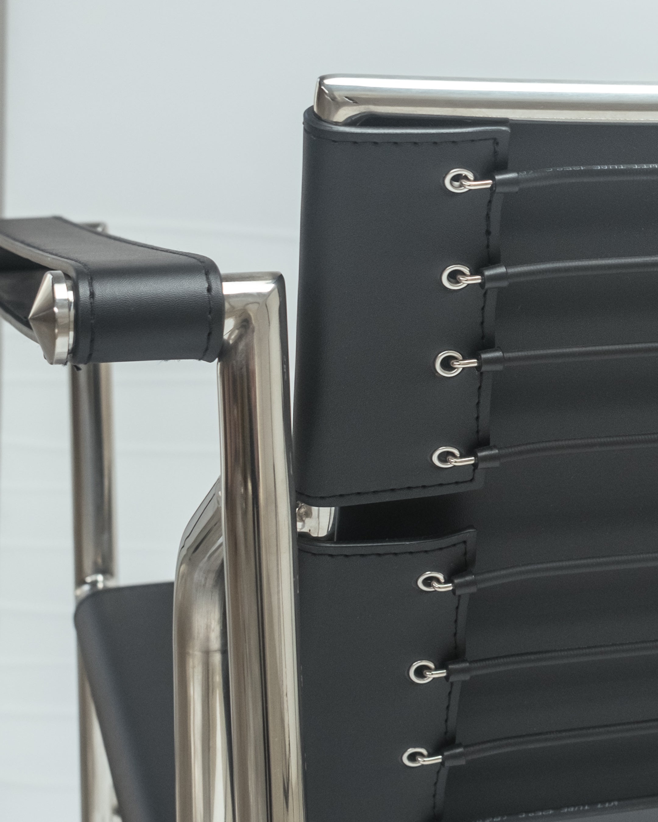 Explore the Basculant Chair by Le Corbusier, first exhibited in 1929. This stylish, vintage design combines timeless elegance with exceptional comfort.